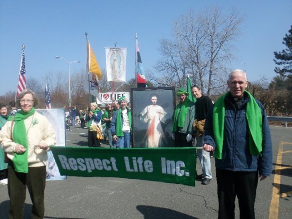 Liz O'Brien of Rockland Right to Life Committee and Fr. Jim McKenna of the Marian Shrine lead the "Respect Life" group in the St. Patrick's Day Parade 2011.